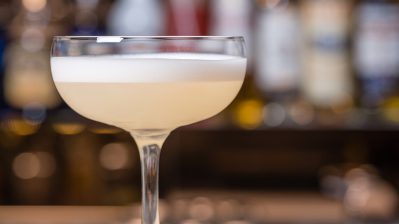 pink cocktail with a foam top