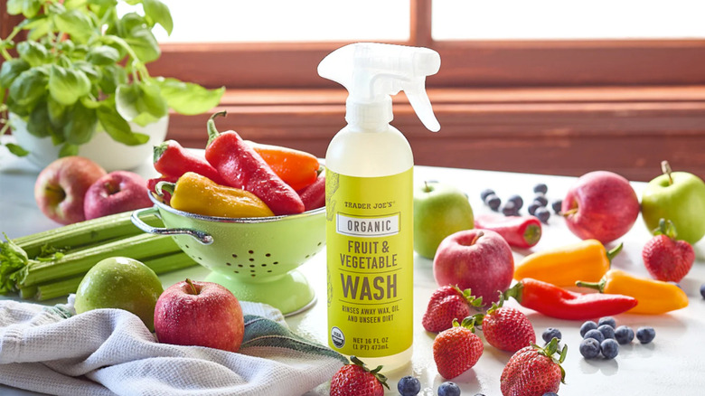 Trader Joe's Organic Fruit and Vegetable Wash surrounded by produce