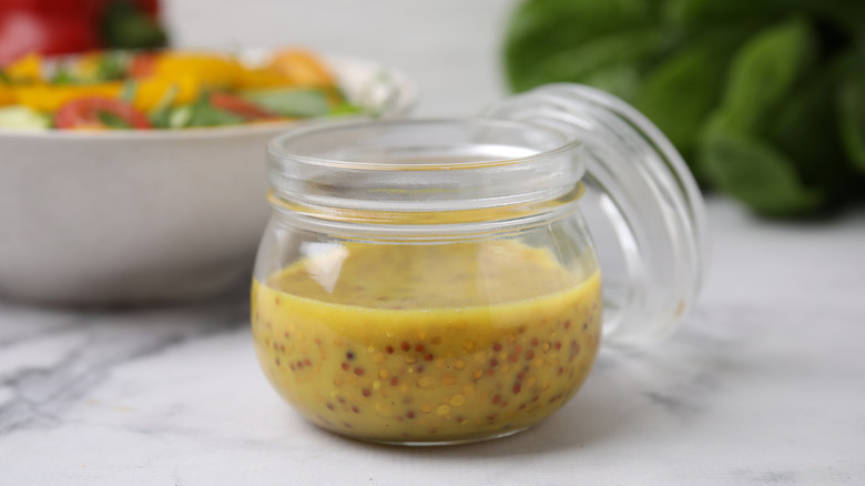 Mustard vinaigrette in a glass jar