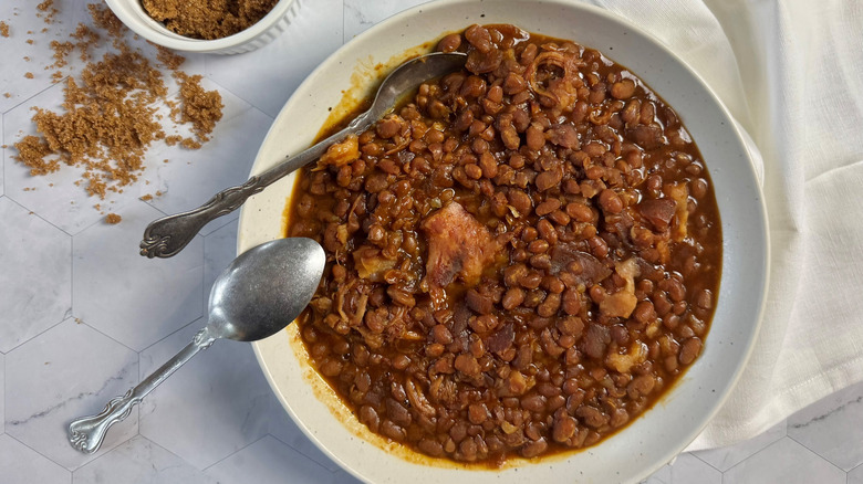 bowl of baked beans with spoons