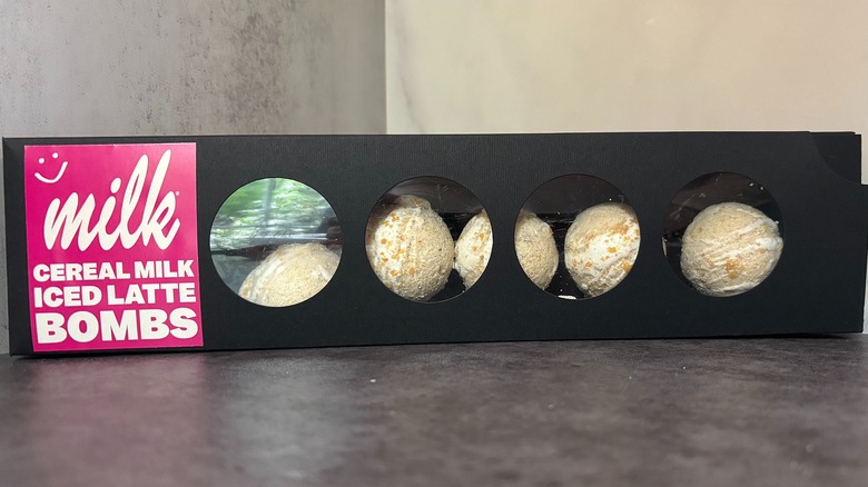 Box of Milk Bar Cereal Milk Iced Latte Bombs on black surface