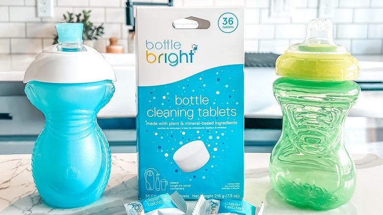 Bottle Bright package on the counter next to water bottles
